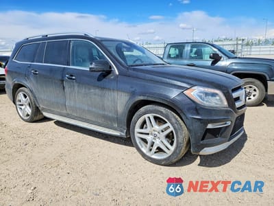 Czwarte zdjęcie samochodu z boku: 2013 MERCEDES-BENZ GL 350 BLUETEC VIN:4JGDF2EEXDA238143 - miniatura