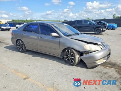 Czwarte zdjęcie samochodu z boku: 2003 TOYOTA COROLLA LE VIN:1NXBR32E43Z152686 - miniatura