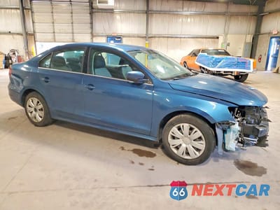 Czwarte zdjęcie samochodu z boku: 2017 VOLKSWAGEN JETTA S VIN:3VW2B7AJXHM328230 - miniatura
