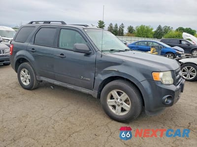 Czwarte zdjęcie samochodu z boku: 2010 FORD ESCAPE HYBRID VIN:1FMCU4K37AKC29552 - miniatura