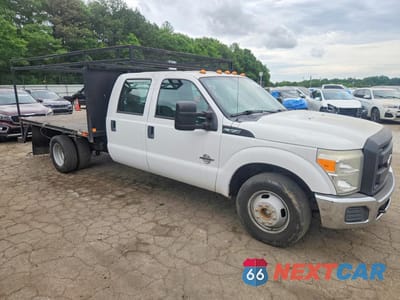 Czwarte zdjęcie samochodu z boku: 2014 FORD F350 SUPER DUTY VIN:1FD8W3GTXEEB84758 - miniatura