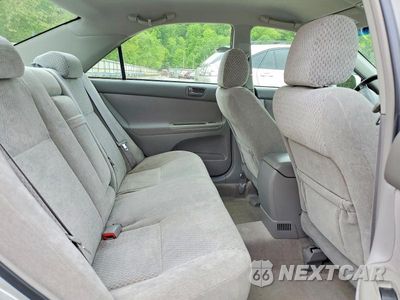 Zdjęcie 10 z 12 samochodu: 2004 TOYOTA CAMRY LE VIN:4T1BE32K34U277794 - miniatura