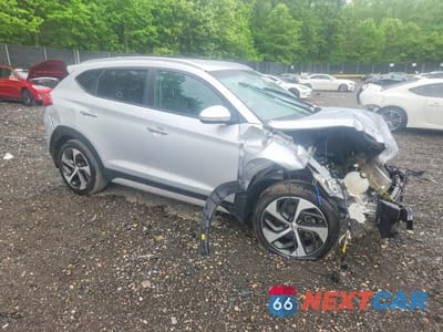 Czwarte zdjęcie samochodu z boku: 2017 HYUNDAI TUCSON LIMITED VIN:KM8J33A28HU476395 - miniatura