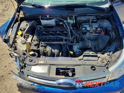Zdjęcie 11 z 12 samochodu: 2008 FORD FOCUS S VIN:1FAHP34N38W137079 - miniatura