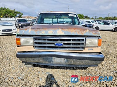Piąte zdjęcie samochodu w środku: 1990 FORD F150 VIN:1FTDF15N2LPB22963 - miniatura