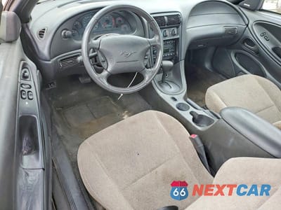 Zdjęcie 8 z 13 samochodu: 2002 FORD MUSTANG VIN:1FAFP40472F182091 - miniatura