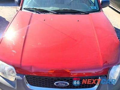 Zdjęcie 12 z 13 samochodu: 2003 FORD ESCAPE XLT VIN:1FMCU93103KC97561 - miniatura
