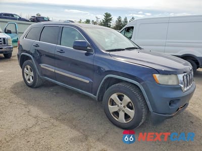 Czwarte zdjęcie samochodu z boku: 2012 JEEP GRAND CHEROKEE LAREDO VIN:1C4RJFAGXCC216654 - miniatura