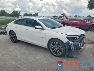 Czwarte zdjęcie samochodu z boku: 2020 CHEVROLET MALIBU PREMIER VIN:1G1ZE5SX3LF008605 - miniatura