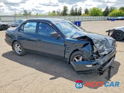 Czwarte zdjęcie samochodu z boku: 1997 TOYOTA COROLLA BASE VIN:1NXBA02EXVZ634619 - miniatura