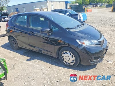Czwarte zdjęcie samochodu z boku: 2018 HONDA FIT LX VIN:3HGGK5H44JM735352 - miniatura