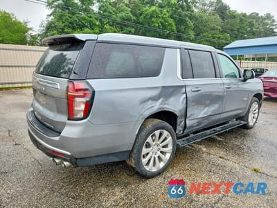 Trzecie zdjęcie samochodu z tyłu: 2023 CHEVROLET SUBURBAN C1500 PREMIER VIN:1GNSCFKD9PR185133 - miniatura