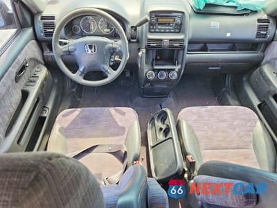 Zdjęcie 8 z 12 samochodu: 2002 HONDA CR-V LX VIN:JHLRD68402C003443 - miniatura