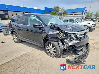 Czwarte zdjęcie samochodu z boku: 2020 HONDA PILOT EXL VIN:5FNYF6H5XLB061429 - miniatura