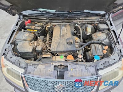 Zdjęcie 12 z 13 samochodu: 2012 SUZUKI GRAND VITARA PREMIUM VIN:JS3TD0D28C4100164 - miniatura