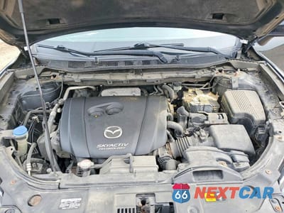 Zdjęcie 12 z 13 samochodu: 2016 MAZDA CX-5 TOURING VIN:JM3KE4CYXG0617653 - miniatura