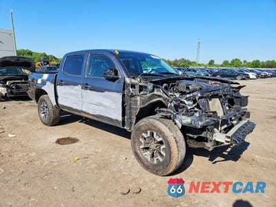 Czwarte zdjęcie samochodu z boku: 2023 TOYOTA TACOMA SR V6 VIN:3TMCZ5AN3PM547071 - miniatura