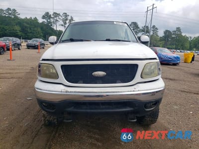 Piąte zdjęcie samochodu w środku: 1999 FORD F150 VIN:1FTRX18L3XNA64179 - miniatura