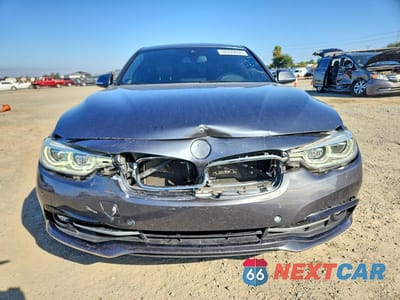 Piąte zdjęcie samochodu w środku: 2018 BMW 330 I VIN:WBA8B9G5XJNV00591 - miniatura
