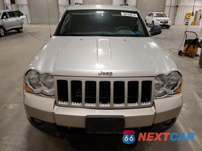 Piąte zdjęcie samochodu w środku: 2009 JEEP GRAND CHEROKEE LAREDO VIN:1J8HR48P49C552638 - miniatura