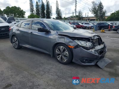 Czwarte zdjęcie samochodu z boku: 2018 HONDA CIVIC EX VIN:JHMFC1F30JX039848 - miniatura