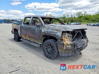 Czwarte zdjęcie samochodu z boku: 2018 GMC SIERRA K1500 SLT VIN:3GTU2NEC0JG264098 - miniatura