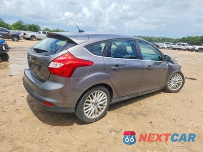 Trzecie zdjęcie samochodu z tyłu: 2012 FORD FOCUS SEL VIN:1FAHP3M20CL410348 - miniatura