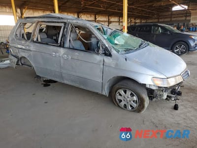 Czwarte zdjęcie samochodu z boku: 2004 HONDA ODYSSEY EXL VIN:5FNRL18954B104725 - miniatura