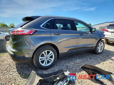 Trzecie zdjęcie samochodu z tyłu: 2019 FORD EDGE SEL VIN:2FMPK3J9XKBB96758 - miniatura