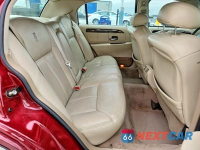 Zdjęcie 10 z 12 samochodu: 1999 LINCOLN TOWN CAR CARTIER VIN:1LNHM83W7XY624911 - miniatura