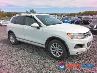 Czwarte zdjęcie samochodu z boku: 2014 VOLKSWAGEN TOUAREG V6 TDI VIN:WVGEP9BP6ED013038 - miniatura