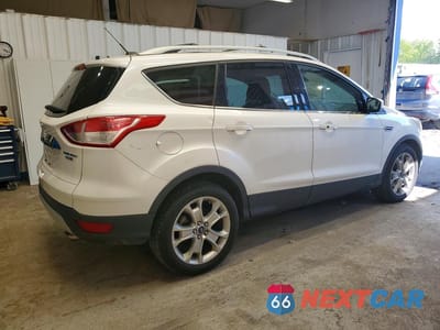 Trzecie zdjęcie samochodu z tyłu: 2016 FORD ESCAPE TITANIUM VIN:1FMCU9JX0GUB85277 - miniatura