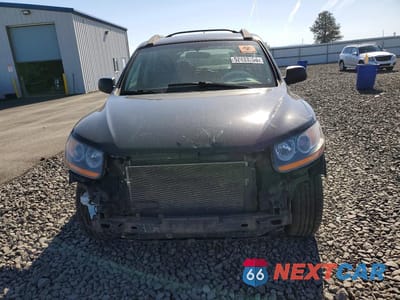 Piąte zdjęcie samochodu w środku: 2011 HYUNDAI SANTA FE GLS VIN:5XYZGDAB2BG087438 - miniatura