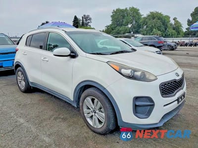 Czwarte zdjęcie samochodu z boku: 2017 KIA SPORTAGE LX VIN:KNDPM3AC8H7123156 - miniatura