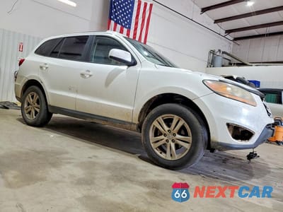 Czwarte zdjęcie samochodu z boku: 2010 HYUNDAI SANTA FE SE VIN:5NMSH4AG0AH373917 - miniatura