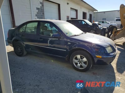 Czwarte zdjęcie samochodu z boku: 2004 VOLKSWAGEN JETTA GLS VIN:3VWSK69MX4M033258 - miniatura