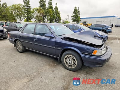 Czwarte zdjęcie samochodu z boku: 1991 TOYOTA CAMRY LE VIN:JT2SV22E0M3461047 - miniatura