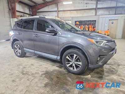 Czwarte zdjęcie samochodu z boku: 2016 TOYOTA RAV4 XLE VIN:2T3RFREV9GW448449 - miniatura