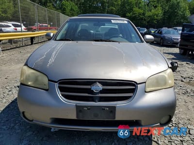Piąte zdjęcie samochodu w środku: 2000 NISSAN MAXIMA GXE VIN:JN1CA31D6YT709946 - miniatura