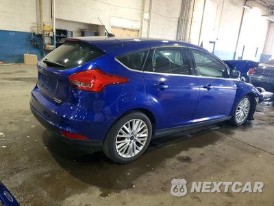 Trzecie zdjęcie samochodu z tyłu: 2015 FORD FOCUS TITANIUM VIN:1FADP3N24FL229965 - miniatura