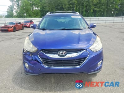 Piąte zdjęcie samochodu w środku: 2013 HYUNDAI TUCSON LIMITED VIN:KM8JU3AC1DU672971 - miniatura