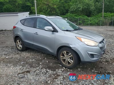 Czwarte zdjęcie samochodu z boku: 2011 HYUNDAI TUCSON GLS VIN:KM8JU3ACXBU276793 - miniatura