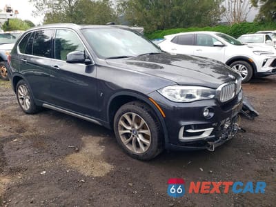 Czwarte zdjęcie samochodu z boku: 2018 BMW X5 XDR40E VIN:5UXKT0C58J0V99396 - miniatura