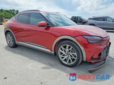 Czwarte zdjęcie samochodu z boku: 2023 GENESIS GV60 ADVANCED VIN:KMUKCDTC5PU017843 - miniatura