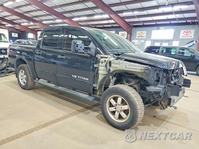 Czwarte zdjęcie samochodu z boku: 2010 NISSAN TITAN PRO4 VIN:1N6AA0EC0AN304869 - miniatura