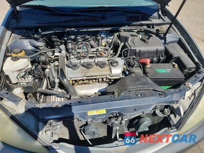 Zdjęcie 11 z 12 samochodu: 2004 TOYOTA CAMRY LE V6 VIN:4T1BF30K94U573936 - miniatura