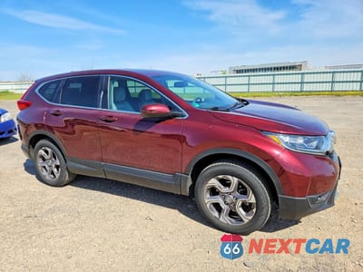 Czwarte zdjęcie samochodu z boku: 2018 HONDA CR-V EXL VIN:7FARW2H81JE091329 - miniatura