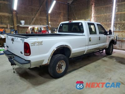 Trzecie zdjęcie samochodu z tyłu: 2002 FORD F350 SRW SUPER DUTY VIN:1FTSW31S42EA45876 - miniatura