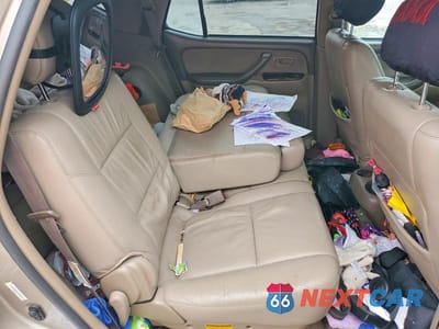Zdjęcie 11 z 13 samochodu: 2004 TOYOTA SEQUOIA SR5 VIN:5TDBT44AX4S233302 - miniatura
