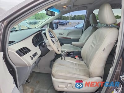 Zdjęcie 7 z 13 samochodu: 2014 TOYOTA SIENNA XLE 8-PASSENGER VIN:5TDYK3DC2ES466830 - miniatura